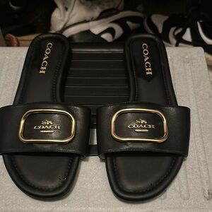 Coach Black and Gold Slide Sandals with Logo Plaques